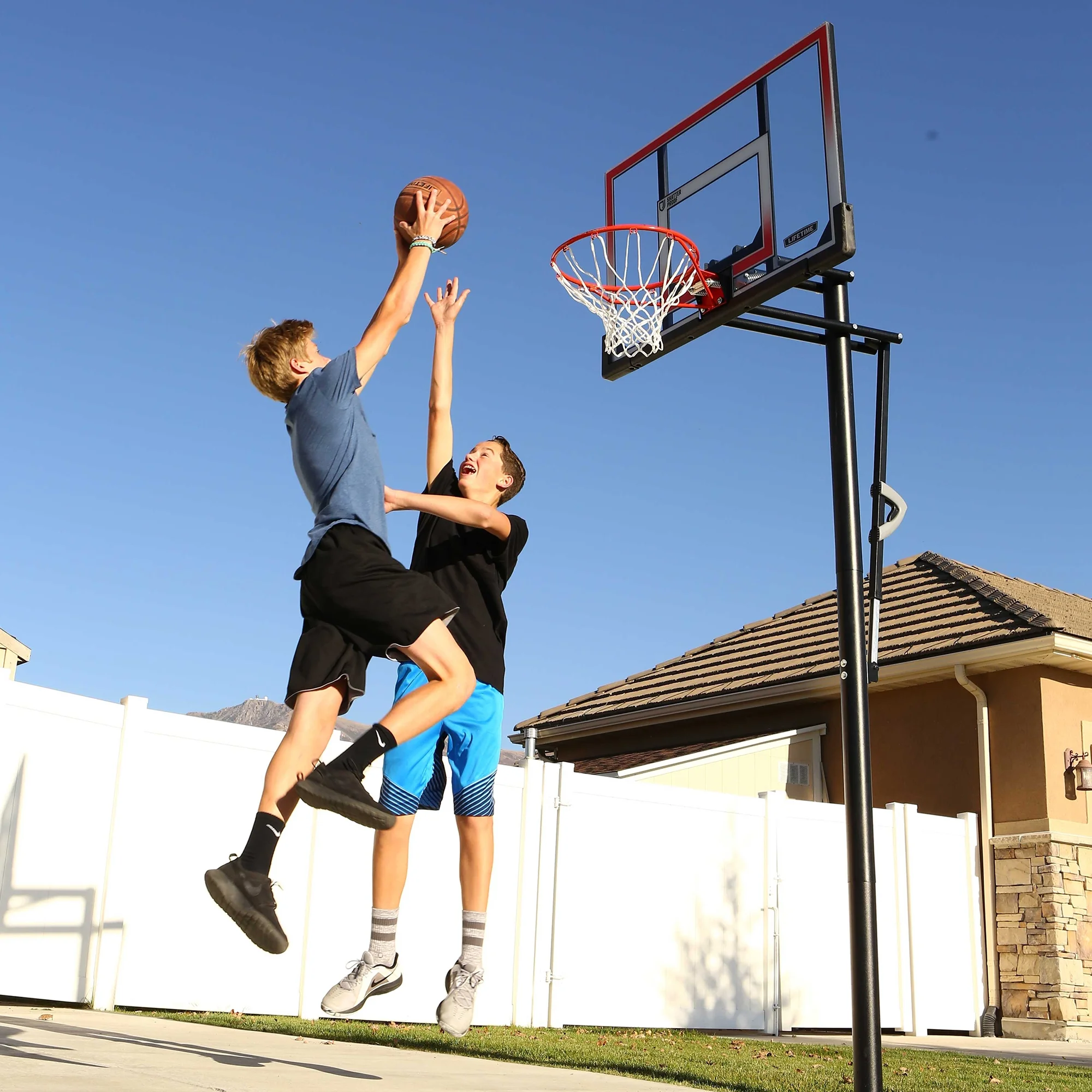 Lifetime 50-Inch Shatterproof Inground Basketball Hoop with Action Grip Adjustment & Slam-It Rim – Model 71799-Outdoor Play
