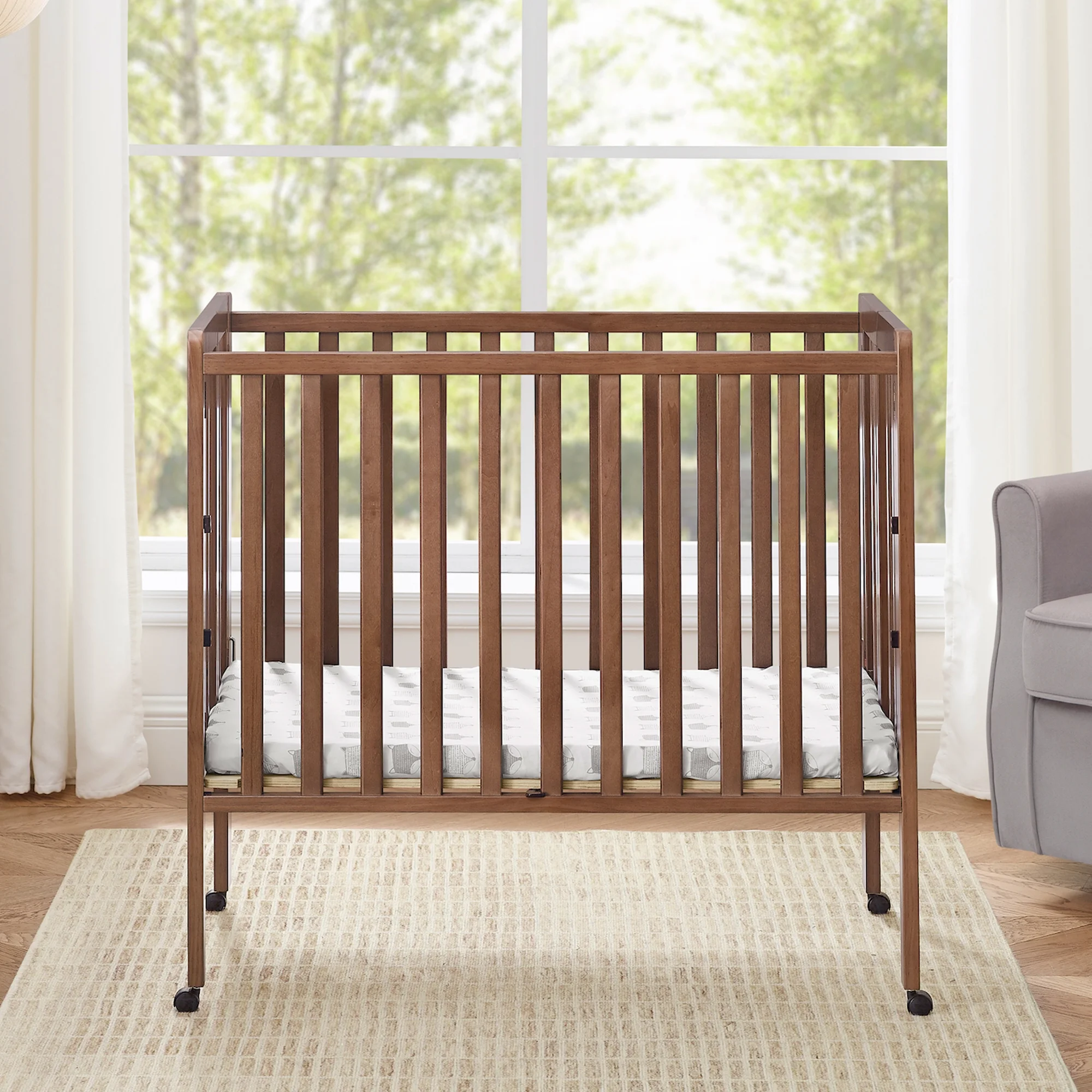 Delta Children Lee Portable Folding Mini Crib with 1.5-Inch Mattress - Greenguard Gold Certified, Bianca White