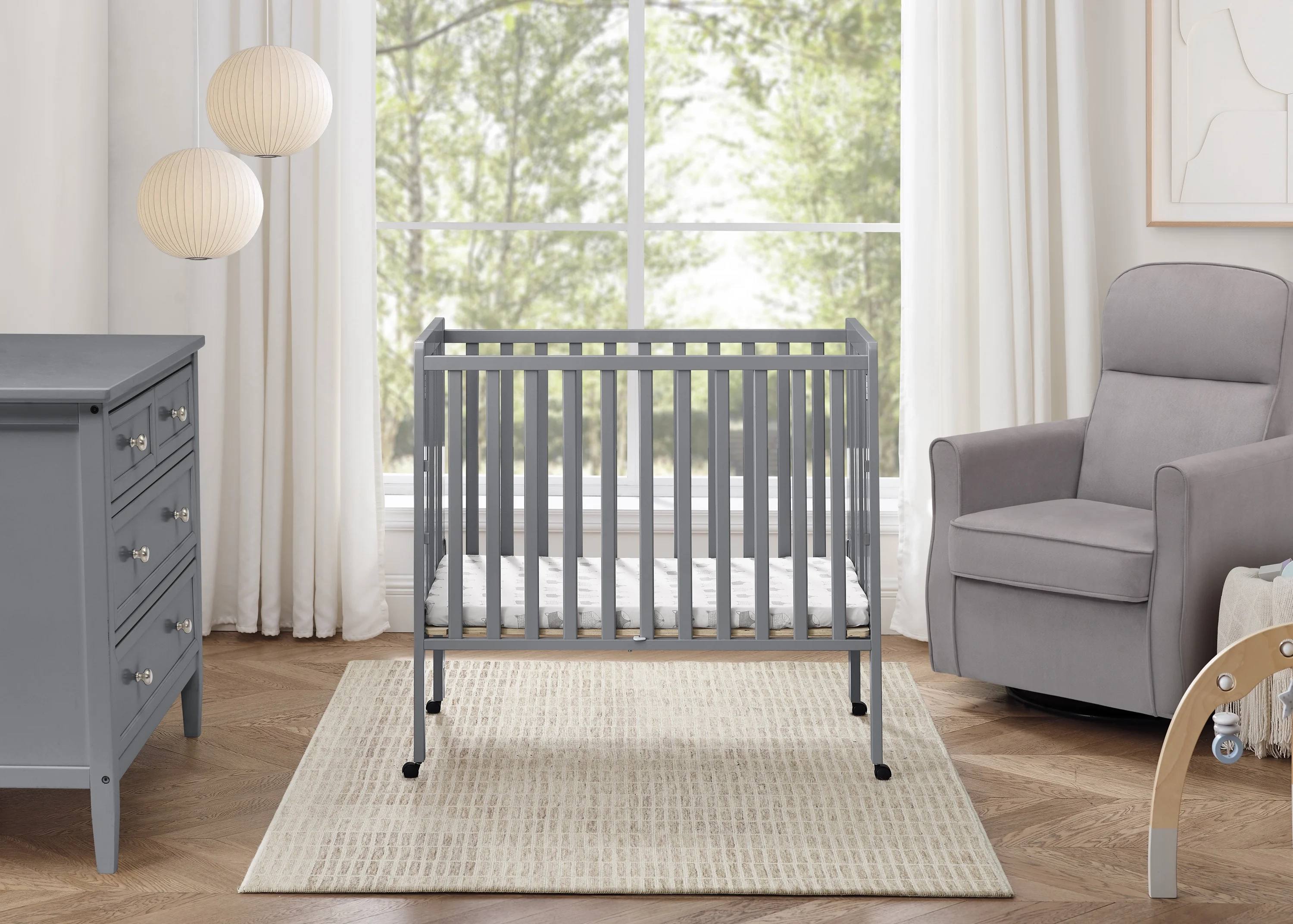 Delta Children Lee Portable Folding Mini Crib with 1.5-Inch Mattress - Greenguard Gold Certified, Bianca White